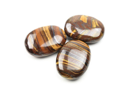 Large Banded Tiger's Eye Palm Stones. The Golden color energy of Tiger's eye resonates with the Solar Plexus Chakra. One of the most popular stones for healing the solar plexus.