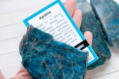 raw blue apatite slabs shown with a metaphysical meaning card by Cape Cod Crystals