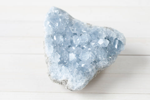 A Large, Light Blue Celestite Crystal Cluster from Madagascar. Celestite is a very popular stone for the third eye chakra.