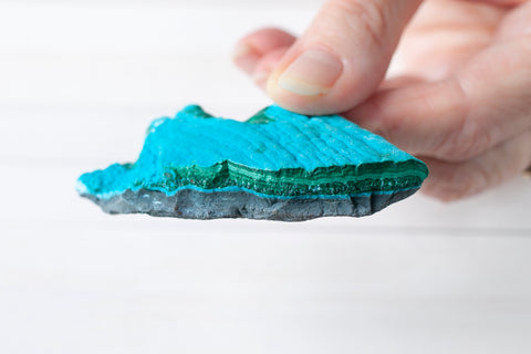 Chrysocolla often forms with Malachite