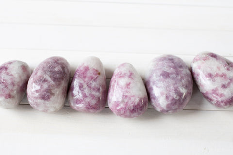 large purple and white lepidolite stones